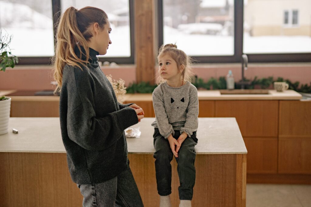 girl and woman discussing challenging news